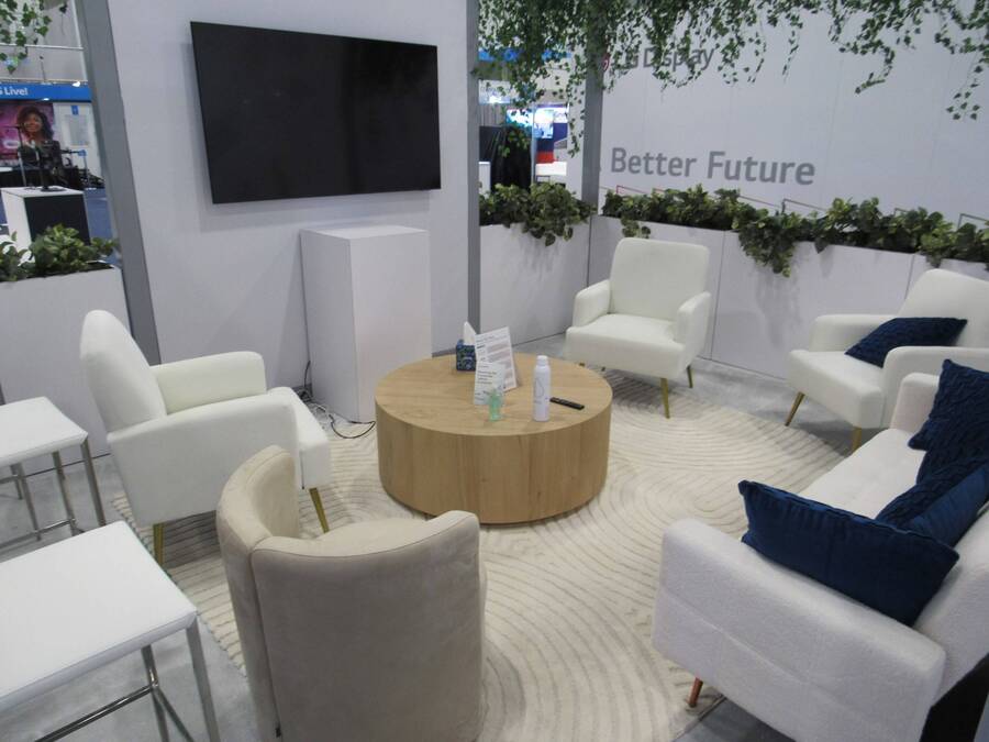 Lounge seating area in Sibros's CES 2024 booth