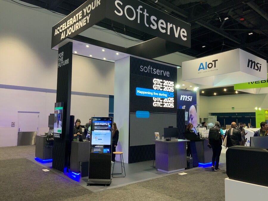 SoftServe's 20x20 island at NVIDIA GTC with an Accelerate Your AI Journey header