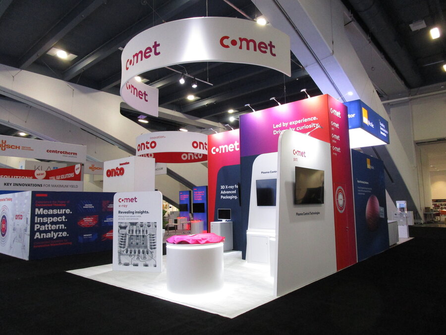 COMET's 20x20 island at SEMICON West with a curved overhead sign
