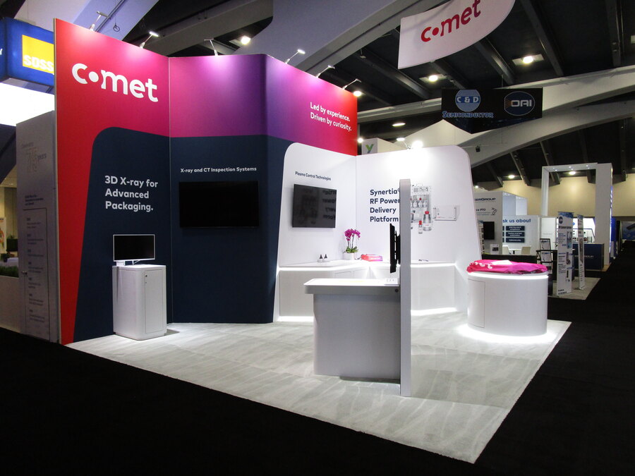 COMET's SEMICON West booth with demo counters and product displays