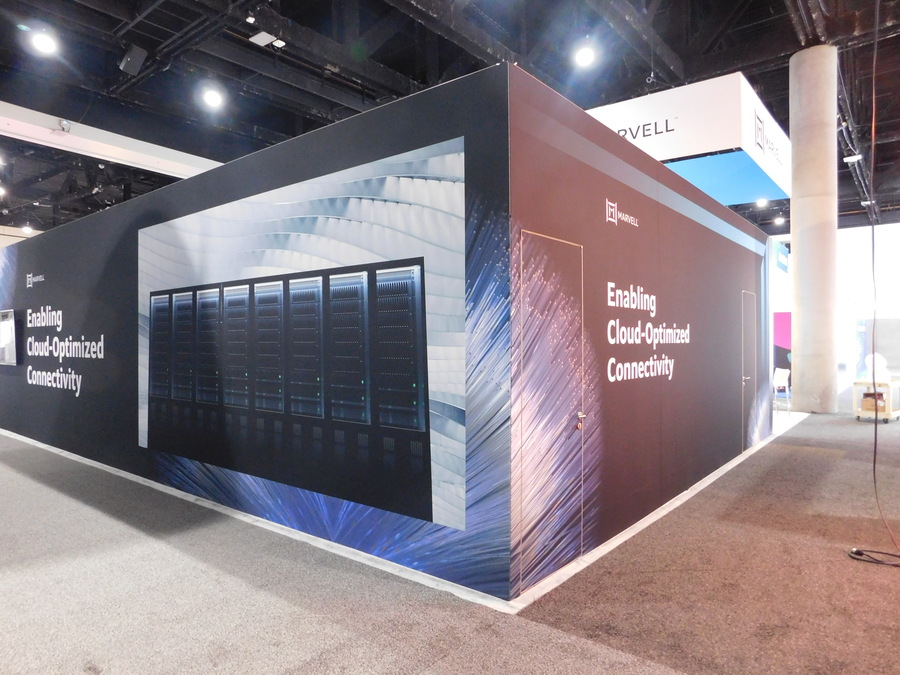 Marvell's OFC booth corner with a server-rack graphic